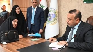 وزير العمل يعلن إطفاء ديون أسر شهداء الحشد الشعبي